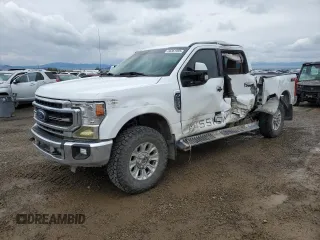 2021 Ford F-250 XL z VIN 1FT7W2BN8MED45769, wystawiony jako Copart lot #56361955 z przebiegiem 93 595 mil mil oraz Czysty tytuł • Clean title. Historia ofert i sprzedaży dostępna na DreamBid. Obrazek 1.