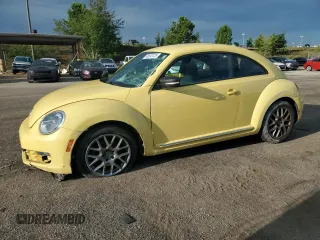 2012 Volkswagen Beetle 2.5L PZEV with VIN 3VWJP7AT2CM606545, listed as a Copart auction lot 66693125 with 116,149 mi miles and Clean title. Bid and sale history available at DreamBid. Image 1.