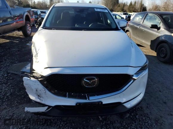 2018 Mazda CX-5 Grand Touring z VIN JM3KFBDM6J0337006, wystawiony jako Copart lot #87155694 z przebiegiem 50 643 mil mil oraz Szkoda całkowita • Salvage title. Historia ofert i sprzedaży dostępna na DreamBid. Obrazek 5.