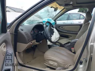 2000 Nissan Maxima GXE z VIN JN1CA31D2YT531324, wystawiony jako IAAI lot #42126970 z przebiegiem 141 864 mil mil oraz . Historia ofert i sprzedaży dostępna na DreamBid. Obrazek 5.