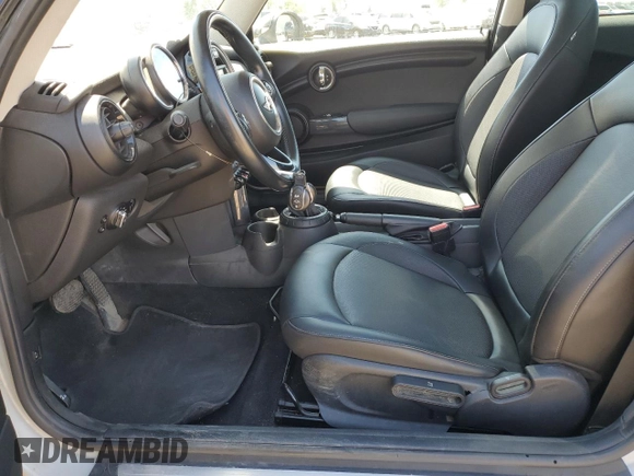 2015 MINI Hardtop with VIN WMWXM5C51F3A04184, listed as a Copart auction lot 63742035 with 150,029 mi miles and Salvage title. Bid and sale history available at DreamBid. Image 7.