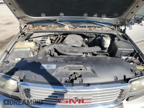 2004 GMC Yukon SLE with VIN 1GKEK13T74J249122, listed as a Copart auction lot 77323354 with 0 mi miles and Clean Title. Bid and sale history available at carsss.com. Image 12.