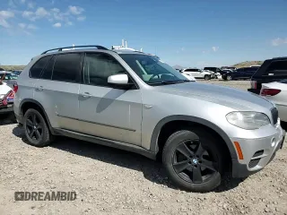 2013 BMW X5 xDrive35i z VIN 5UXZV4C50D0E05712, wystawiony jako Copart lot #57557575 z przebiegiem 118 243 mil mil oraz Szkoda całkowita • Salvage title. Historia ofert i sprzedaży dostępna na DreamBid. Obrazek 13.