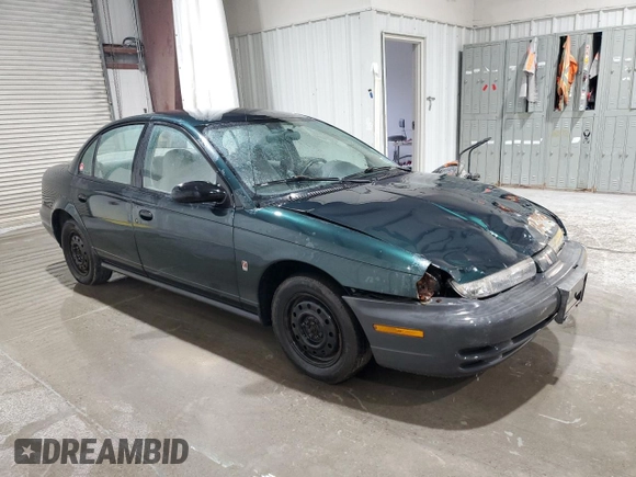 1998 Saturn SL z VIN 1G8ZH5280WZ312544, wystawiony jako Copart lot #50971665 z przebiegiem 119 855 mil mil oraz Szkoda całkowita • Salvage title. Historia ofert i sprzedaży dostępna na DreamBid. Obrazek 4.