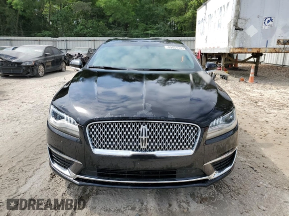 2019 Lincoln MKZ Reserve II z VIN 3LN6L5E98KR617764, wystawiony jako Copart lot #53246005 z przebiegiem 108 017 mil mil oraz Tytuł czysty. Historia ofert i sprzedaży dostępna na DreamBid. Obrazek 5.