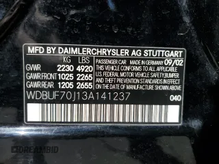 2003 Mercedes-Benz E-Class 5.0L with VIN WDBUF70J13A141237, listed as a Copart auction lot 73498264 with 138,623 mi miles and Salvage Title. Bid and sale history available at carsss.com. Image 12.