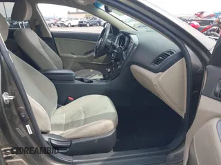 2014 Kia Optima LX with VIN 5XXGM4A7XEG334175, listed as a IAAI auction lot 42169281 with 148,774 mi miles. Bid and sale history available at carsss.com. Image 5.
