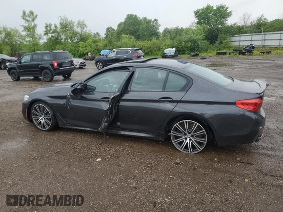 2020 BMW 5 Series M550i xDrive with VIN WBAJS7C06LCD12779, listed as a Copart auction lot 61136215 with 81,286 mi miles and Salvage title. Bid and sale history available at DreamBid. Image 2.