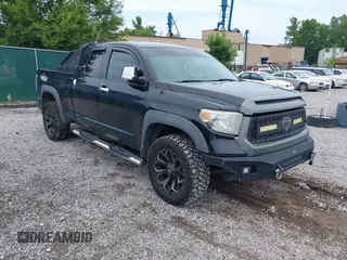 2017 Toyota Tundra SR with VIN 5TFUM5F16HX069846, listed as a IAAI auction lot 42670137 with 136,001 mi miles and . Bid and sale history available at DreamBid. Image 1.