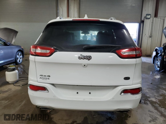 2018 Jeep Cherokee Overland z VIN 1C4PJMJX4JD614218, wystawiony jako Copart lot #69771824 z przebiegiem 59 695 mil mil oraz Szkoda całkowita • Salvage title. Historia ofert i sprzedaży dostępna na DreamBid. Obrazek 6.