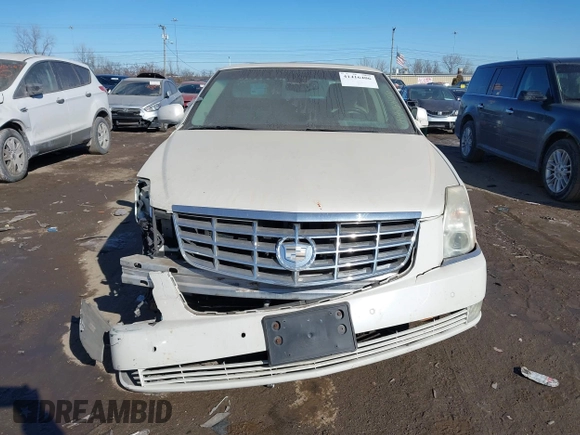 2008 Cadillac DTS 1SD z VIN 1G6KD57YX8U146211, wystawiony jako IAAI lot #41416406 z przebiegiem 141 362 mil mil oraz . Historia ofert i sprzedaży dostępna na DreamBid. Obrazek 6.