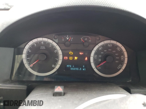 2008 Ford Escape Limited z VIN 1FMCU94108KA14209, wystawiony jako Copart lot #57857305 z przebiegiem 186 893 mil mil oraz Szkoda całkowita • Salvage title. Historia ofert i sprzedaży dostępna na DreamBid. Obrazek 9.