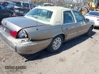 2005 Mercury Grand Marquis GS with VIN 2MEFM74WX5X614325, listed as a IAAI auction lot 41844701 with Not Provided miles and . Bid and sale history available at DreamBid. Image 4.