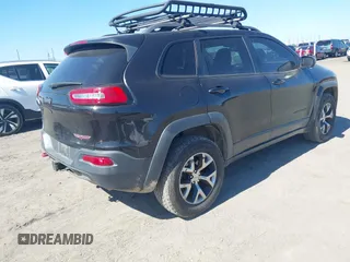 2015 Jeep Cherokee Trailhawk with VIN 1C4PJMBS5FW577470, listed as a IAAI auction lot 41565837 with 191,105 mi miles. Bid and sale history available at carsss.com. Image 4.