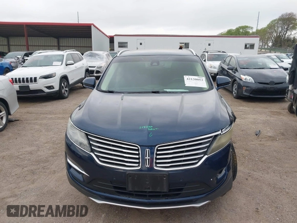 2015 Lincoln MKC z VIN 5LMCJ1A92FUJ36590, wystawiony jako IAAI lot #42130054 z przebiegiem 121 681 mil mil oraz . Historia ofert i sprzedaży dostępna na DreamBid. Obrazek 13.