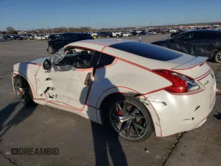 2014 Nissan 370Z Touring with VIN JN1AZ4EH8EM631484, listed as a Copart auction lot 86884574 with 0 mi miles and Salvage Title. Bid and sale history available at carsss.com. Image 2.