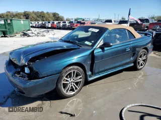 1996 Ford Mustang GT with VIN 1FALP45XXTF235504, listed as a Copart auction lot 45662595 with 57,849 mi miles and Salvage Title. Bid and sale history available at carsss.com. Image 1.