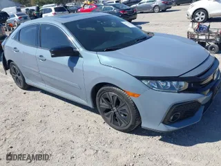 2019 Honda Civic Hatchback EX-L with VIN SHHFK7H88KU411608, listed as a IAAI auction lot 41773252 with 54,846 mi miles. Bid and sale history available at carsss.com. Image 1.