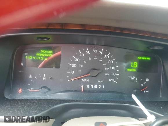 1999 Lincoln Town Car Signature with VIN 1LNHM82W7XY612906, listed as a Copart auction lot 50777435 with 110,414 mi miles and Salvage title. Bid and sale history available at DreamBid. Image 9.