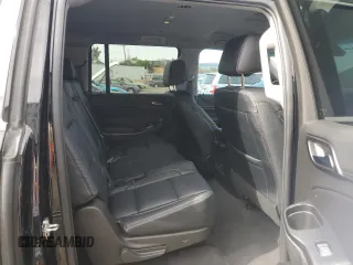2019 Chevrolet Suburban LS z VIN 1GNSCGKC2KR297407, wystawiony jako Copart lot #75224194 z przebiegiem 93 562 mil mil oraz Szkoda całkowita • Salvage title. Historia ofert i sprzedaży dostępna na DreamBid. Obrazek 11.