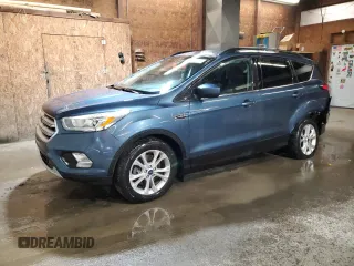 2018 Ford Escape SEL with VIN 1FMCU9HDXJUB39135, listed as a Copart auction lot 52093075 with 69,604 mi miles and Salvage Title. Bid and sale history available at carsss.com. Image 1.