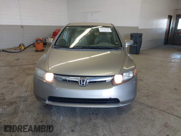 2006 Honda Civic LX z VIN 1HGFA16556L005459, wystawiony jako IAAI lot #41940768 z przebiegiem 178 595 mil mil oraz . Historia ofert i sprzedaży dostępna na DreamBid. Obrazek 12.