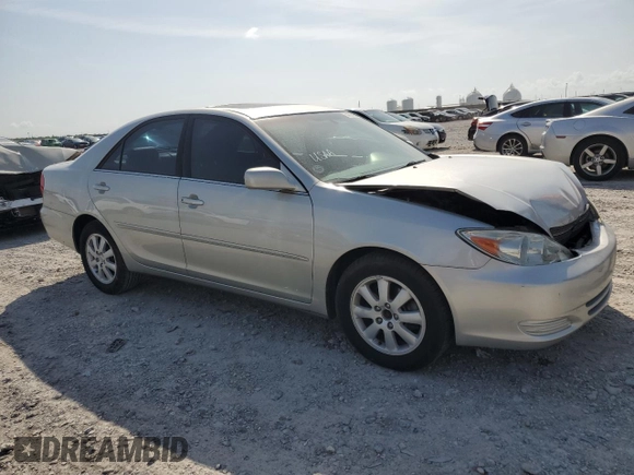2002 Toyota Camry XLE z VIN 4T1BF32K22U532171, wystawiony jako Copart lot #54527965 z przebiegiem 165 637 mil mil oraz Szkoda całkowita • Salvage title. Historia ofert i sprzedaży dostępna na DreamBid. Obrazek 4.