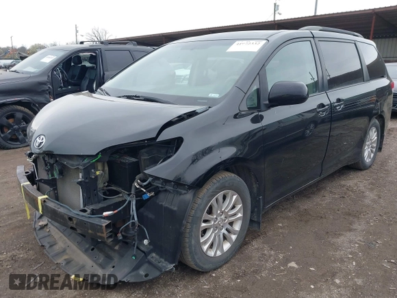 2011 Toyota Sienna XLE AAS with VIN 5TDYK3DC9BS071636, listed as a IAAI auction lot 41972332 with 204,477 mi miles and . Bid and sale history available at DreamBid. Image 18.