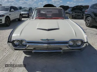 1961 Ford Thunderbird with VIN 1Y73Z112797, listed as a Copart auction lot 77574894 with 22,246 mi miles and Salvage Title. Bid and sale history available at DreamBid. Image 5.