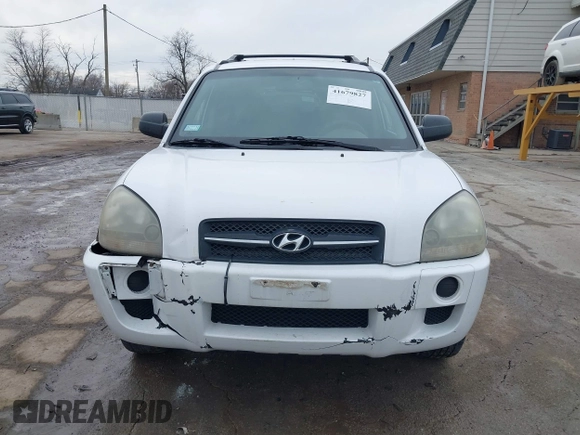 2006 Hyundai Tucson GL with VIN KM8JM12BX6U467288, listed as a IAAI auction lot 41679827 with 146,973 mi miles. Bid and sale history available at carsss.com. Image 13.