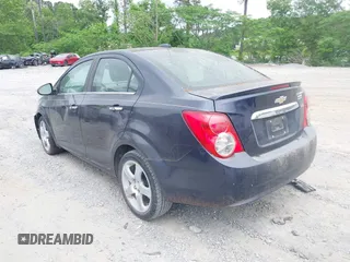 2016 Chevrolet Sonic LTZ z VIN 1G1JE5SB7G4156694, wystawiony jako IAAI lot #42157696 z przebiegiem 154 337 mil mil oraz . Historia ofert i sprzedaży dostępna na DreamBid. Obrazek 3.