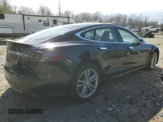 2014 Tesla Model S 60 with VIN 5YJSA1H10EFP34137, listed as a Copart auction lot 47645795 with Not provided miles and Salvage title. Bid and sale history available at DreamBid. Image 3.
