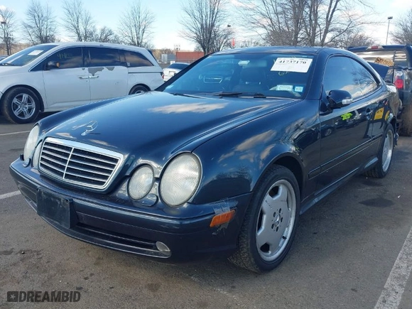 2002 Mercedes-Benz CLK-Class AMG with VIN WDBLJ74GX2T106286, listed as a IAAI auction lot 41737170 with 136,170 mi miles. Bid and sale history available at carsss.com. Image 2.