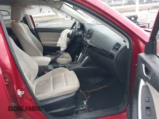 2014 Mazda CX-5 Touring with VIN JM3KE2CY2E0322211, listed as a IAAI auction lot 41721219 with 127,312 mi miles. Bid and sale history available at carsss.com. Image 5.