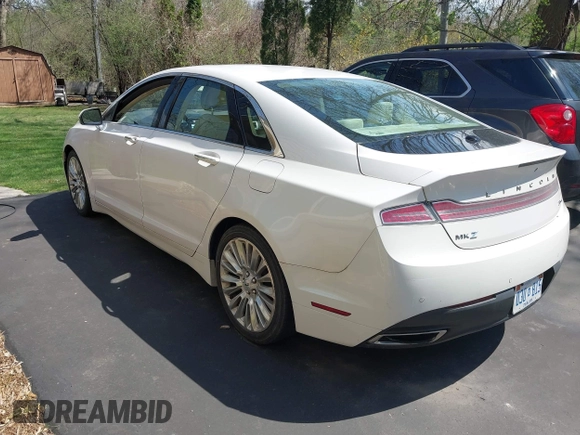 2014 Lincoln MKZ with VIN 3LN6L2G95ER827769, listed as a IAAI auction lot 42109075 with 154,000 mi miles. Bid and sale history available at carsss.com. Image 3.