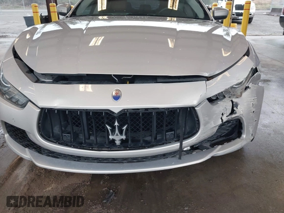 2017 Maserati Ghibli with VIN ZAM57XSLXH1238134, listed as a IAAI auction lot 41871754 with 34,776 mi miles. Bid and sale history available at carsss.com. Image 6.