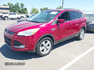 2014 Ford Escape SE z VIN 1FMCU9GX3EUB64623, wystawiony jako IAAI lot #42560923 z przebiegiem 120 730 mil mil oraz . Historia ofert i sprzedaży dostępna na DreamBid. Obrazek 2.