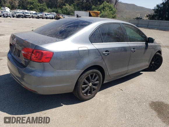 2013 Volkswagen Jetta SE with VIN 3VWDP7AJ5DM355176, listed as a Copart auction lot 60324525 with 192,226 mi miles and Salvage title. Bid and sale history available at DreamBid. Image 3.