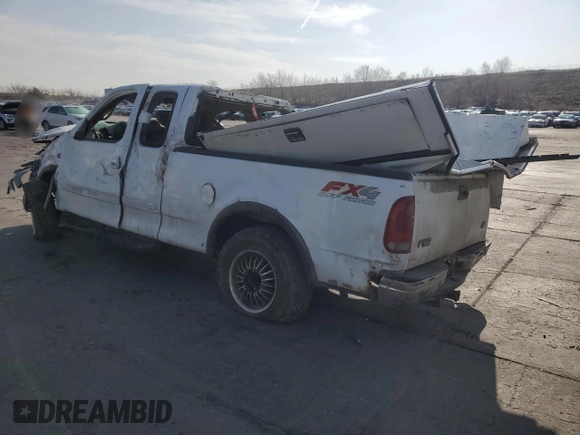 2002 Ford F-150 XL with VIN 1FTRX18L12NA01509, listed as a Copart auction lot 51098435 with Not provided miles and Salvage title. Bid and sale history available at DreamBid. Image 2.