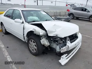 2000 Toyota Camry LE z VIN JT2BF28K3Y0289145, wystawiony jako IAAI lot #42455085 z przebiegiem 202 809 mil mil oraz . Historia ofert i sprzedaży dostępna na DreamBid. Obrazek 6.