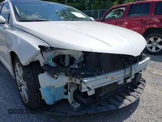 2013 Lincoln MKZ Hybrid with VIN 3LN6L2LU6DR807667, listed as a IAAI auction lot 42533419 with 90,327 mi miles and . Bid and sale history available at DreamBid. Image 14.