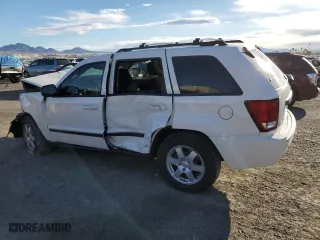 2009 Jeep Grand Cherokee Laredo with VIN 1J8GR48K39C539220, listed as a Copart auction lot 49711345 with 125,505 mi miles and Salvage Title. Bid and sale history available at carsss.com. Image 2.