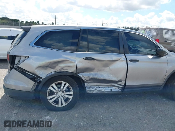 2016 Honda Pilot LX with VIN 5FNYF6H1XGB099987, listed as a IAAI auction lot 41556979 with 98,373 mi miles. Bid and sale history available at carsss.com. Image 6.