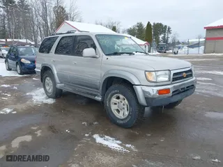 1998 Toyota 4Runner Limited with VIN JT3HN87RXW0144093, listed as a IAAI auction lot 41520901 with 205,623 mi miles. Bid and sale history available at carsss.com. Image 1.