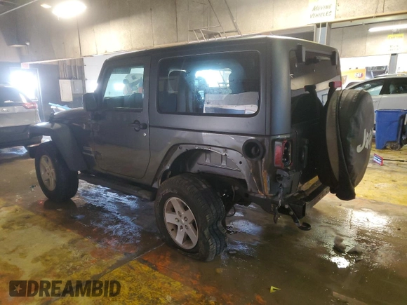 2017 Jeep Wrangler Willys Wheeler with VIN 1C4AJWAG3HL751703, listed as a Copart auction lot 88861635 with 14,114 mi miles and Salvage Title. Bid and sale history available at DreamBid. Image 2.