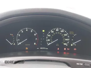 1996 Lexus LS 400 z VIN JT8BH22F3T0063272, wystawiony jako IAAI lot #41466981 z przebiegiem 182 291 mil mil oraz . Historia ofert i sprzedaży dostępna na DreamBid. Obrazek 7.