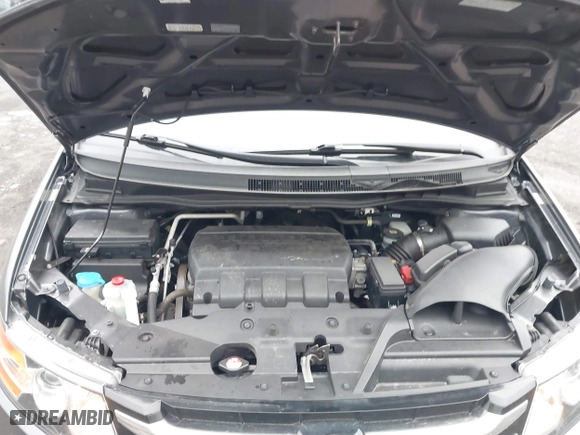 2016 Honda Odyssey SE with VIN 5FNRL5H3XGB150025, listed as a IAAI auction lot 41857704 with 69,515 mi miles. Bid and sale history available at carsss.com. Image 10.