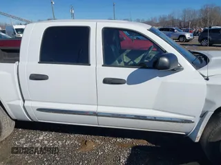 2005 Dodge Dakota Laramie with VIN 1D7HW58N35S189677, listed as a IAAI auction lot 41335613 with 159,501 mi miles and . Bid and sale history available at DreamBid. Image 13.
