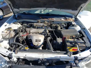 2001 Toyota Camry CE with VIN 4T1BG28KX1U784196, listed as a IAAI auction lot 41830050 with 187,423 mi miles. Bid and sale history available at carsss.com. Image 10.
