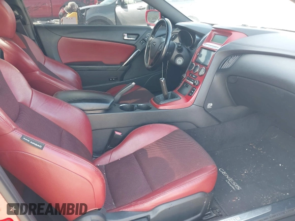 2013 Hyundai Genesis Coupe Track z VIN KMHHU6KJ4DU098623, wystawiony jako IAAI lot #41562667 z przebiegiem 120 690 mil mil oraz . Historia ofert i sprzedaży dostępna na DreamBid. Obrazek 5.